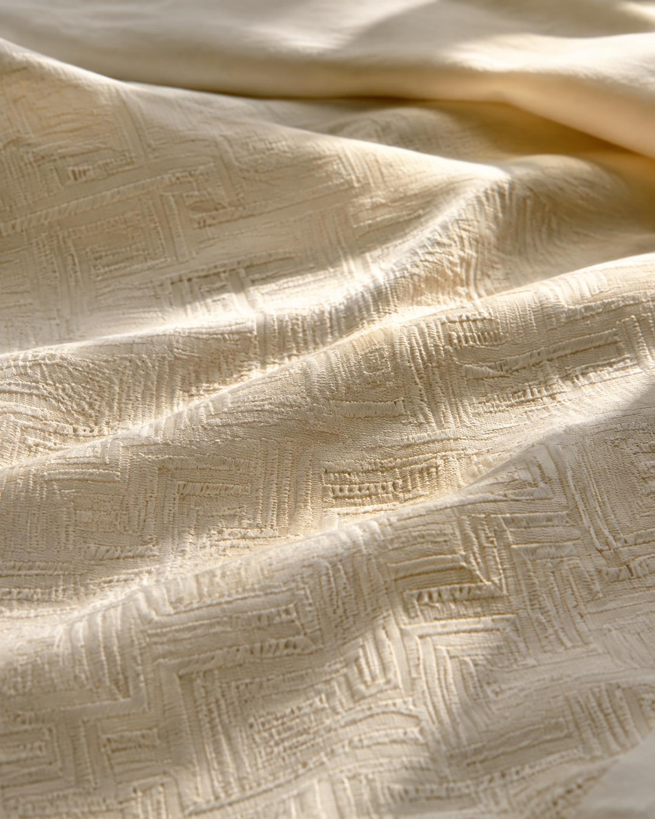 Ivory premium jacquard textile with geometric woven detail